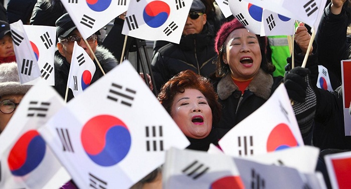 S Korean ruling party asks opposition to amend motion to impeach president